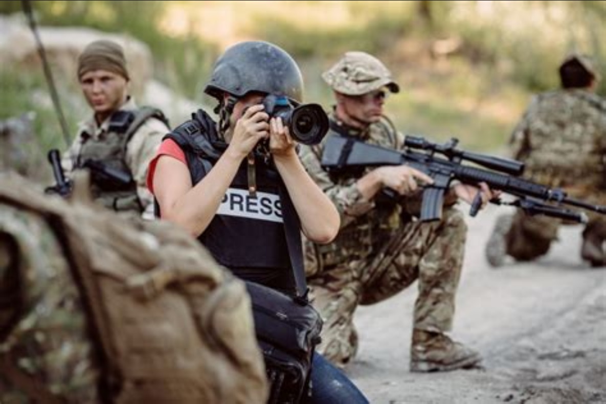 Combat photo journalist