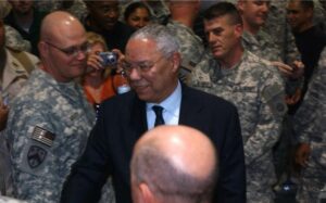 Gen. (Ret.) Colin Powell greets service members at Camp Arifjan, Kuwait, in 2007 during a brief visit there. Powell took time during a business trip to the country to speak to the troops, calling them a great generation.
(Photo by Sgt. 1st Class Jacob McDonald, US Army)